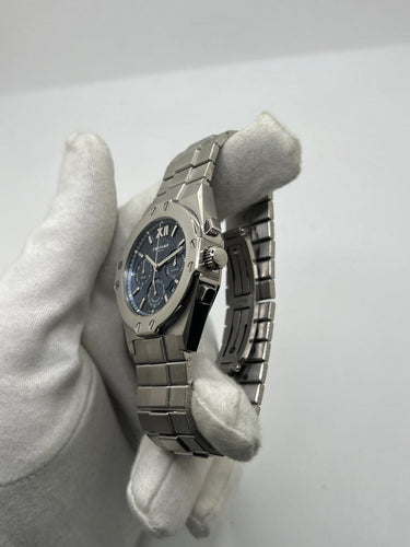 Montre Chopard St. Moritz - Montre chronographe en acier 58 Facettes 2140
