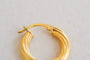 Boucles d'oreilles Mono créole striée en or jaune 18 carats 58 Facettes 4160