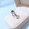 bague-mauboussin-dream-love-rubis-diamants-or-gris-18k-750-ecrin-vue-dessus.png