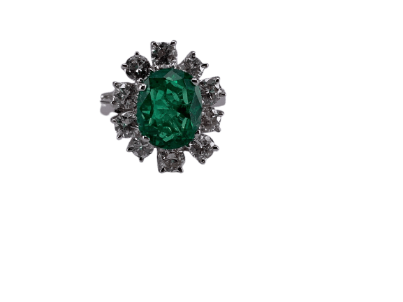 White gold ring with oval emerald and diamonds 