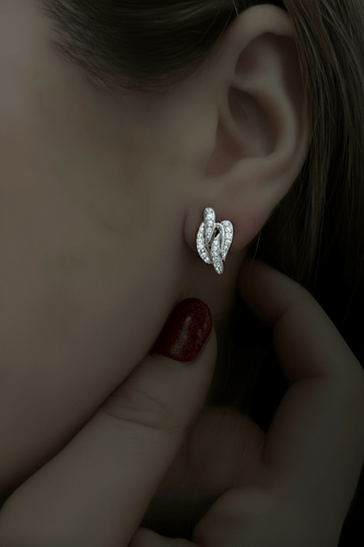Boucles d'oreilles Roberto Borghesi - Boucles d'oreilles entrelacées avec diamants 58 Facettes