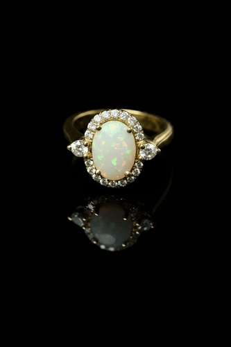 Bague Bague - opale arlequin et diamants en or jaune 58 Facettes