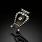 Broche Lira - Broche en or jaune et argent, diamants 58 Facettes
