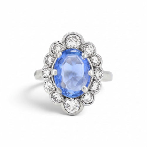 https://cdn.shopify.com/s/files/1/1015/8633/8124/files/vintage-18k-gold-pompadour-madagascar-sapphire-diamond-ring-front.jpg?v=1785506155