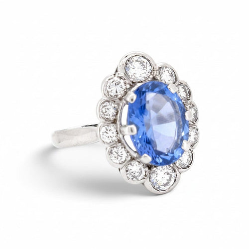 https://cdn.shopify.com/s/files/1/1015/8633/8124/files/vintage-18k-gold-pompadour-madagascar-sapphire-diamond-ring-right.jpg?v=1785506198