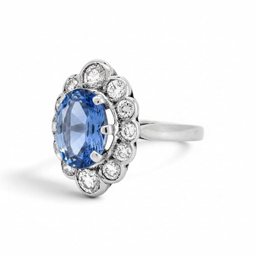 https://cdn.shopify.com/s/files/1/1015/8633/8124/files/vintage-18k-gold-pompadour-madagascar-sapphire-diamond-ring-left.jpg?v=1785506215