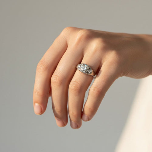 https://cdn.shopify.com/s/files/1/1015/8633/8124/files/antique-art-deco-18k-gold-trilogy-old-cut-diamond-ring-worn.jpg?v=1785509403