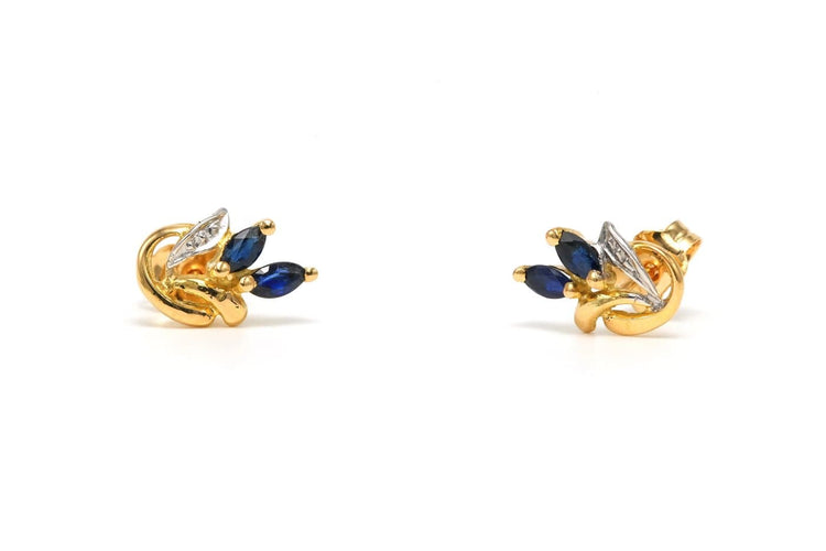 Boucles d'oreilles contemporaines en or jaune et blanc 18 carats et saphirs 58 Facettes 22580