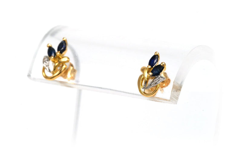 Boucles d'oreilles contemporaines en or jaune et blanc 18 carats et saphirs 58 Facettes 22580