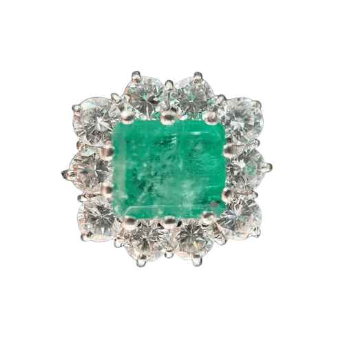 54 Bague marguerite en or blanc, émeraude et diamants 58 Facettes Bague 18