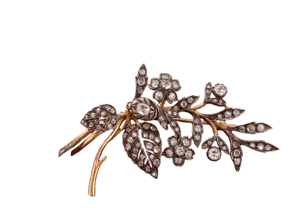 Antique floral brooch in gold and silver set with diamonds 