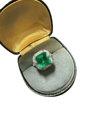 Bague 50 Bague en émeraude de Zambie, diamants et grenats tsavorites 58 Facettes jnci157