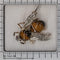 26050-0106.p09_Charmant bi-broche fra mellemkrigstiden  ca  1930  med tigerøje og diamanter-en.jpg