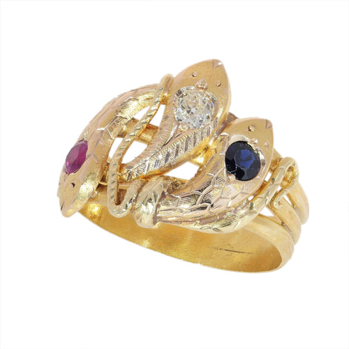 26106-0234.p04_Anillo triple de serpiente en oro texturizado con rubí  zafiro y diamante  ca  1900-en.jpg