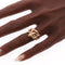 26106-0234.p01_Anillo triple de serpiente en oro texturizado con rubí  zafiro y diamante  ca  1900-en.jpg