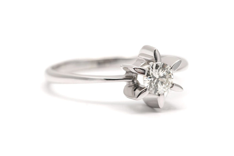 Bague 63 Années 70 - Bague en or blanc et diamant taille brillant 58 Facettes 23920