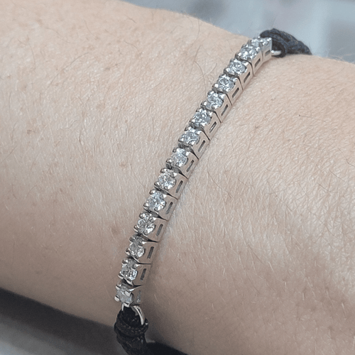 Bracelet ajustable en or blanc 18k et diamants 58 Facettes P161