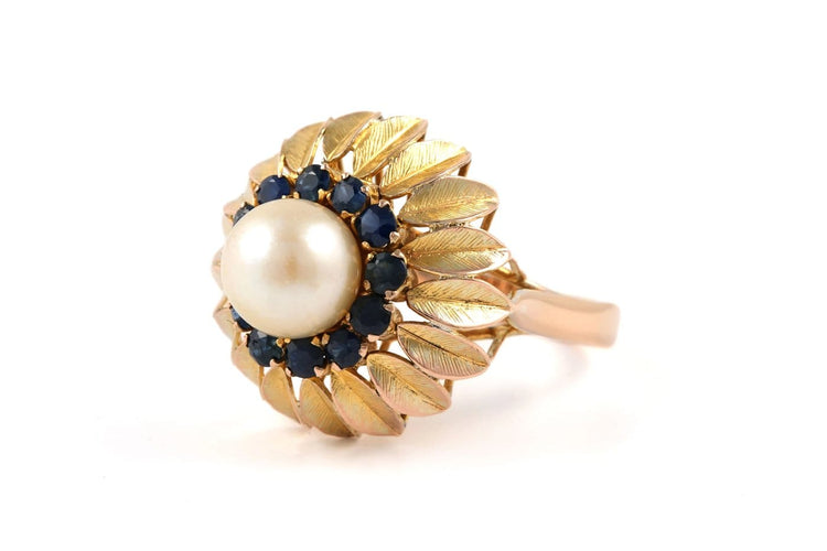 Bague 56 Bague années 50 en or jaune, perle et saphirs 58 Facettes 23900