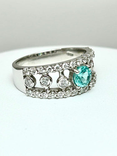 55 Bague en or blanc 18k avec tourmaline Paraíba et diamants 58 Facettes ANELLO ROUND PARAIBA