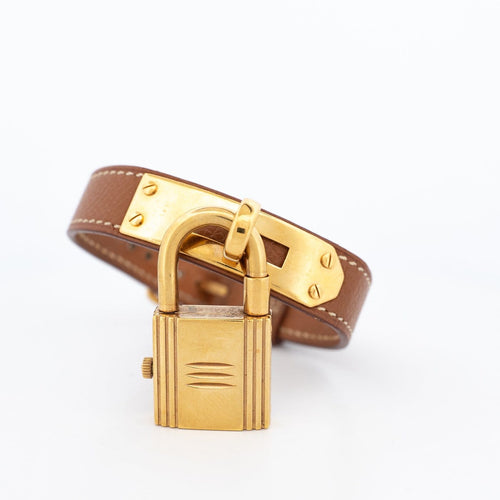 Montre Hermès Kelly - Montre acier plaqué or cadran champagne 58 Facettes 576