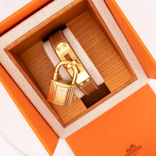 Montre Hermès Kelly - Montre acier plaqué or cadran champagne 58 Facettes 576