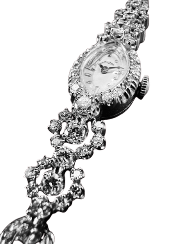 Hamilton - Montre-bracelet en or blanc et diamants 58 Facettes ORL4094 MT