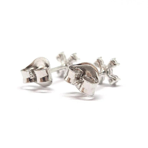 Boucles d'oreilles Boucles d'oreilles croix en or blanc 18 carats et diamants 58 Facettes BVP-BDO-0081