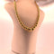 Collier Collier avec boules en or jaune 18 carats 58 Facettes 250192