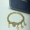 Bracelet Chopard Genève - Bracelet à breloques en or jaune 3 diamants 58 Facettes 250056