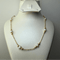 Collier Collier en chaîne avec perles en or jaune 58 Facettes 250016