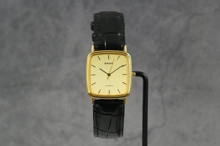 Montre Rado - Montre Tank Quartz en plaqué or 58 Facettes TOT-01399