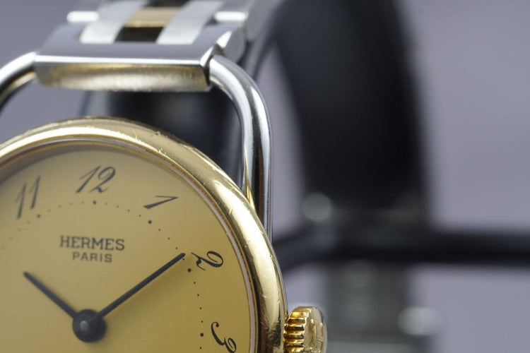 Montre Hermès Arceau - Montre en or jaune et acier 58 Facettes TOT-11230