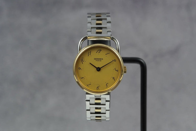 Montre Hermès Arceau - Montre en or jaune et acier 58 Facettes TOT-11230