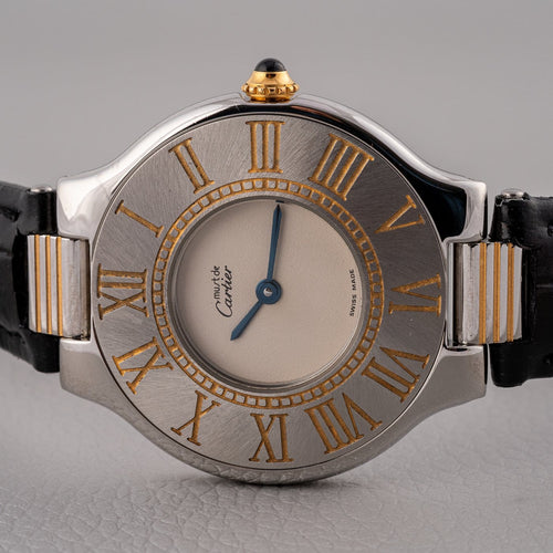 Montre Cartier Must de 21 - Montre en or et acier 58 Facettes TOT-01935