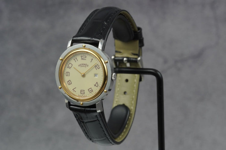 Montre Hermès Clipper - Montre en acier, cadran noir 58 Facettes TOT-11228