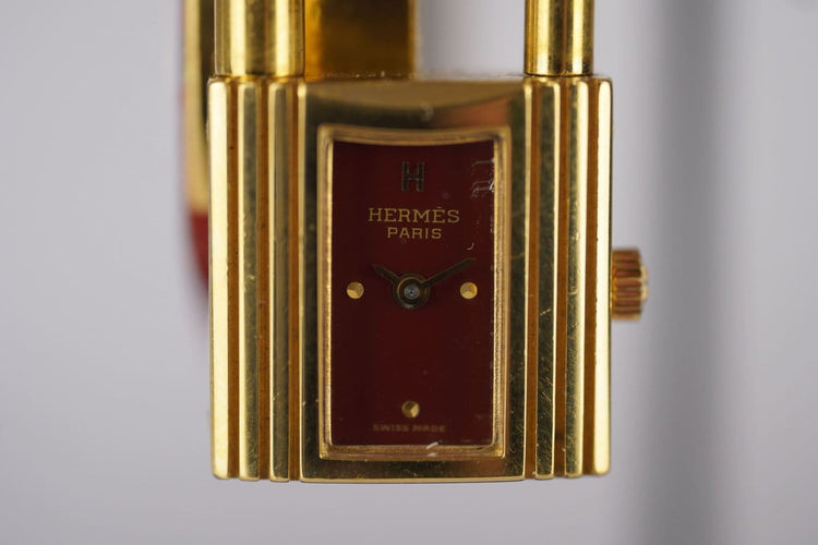 Montre Hermès Kelly - Montre plaqué or cadran bordeaux 58 Facettes TOT-11128