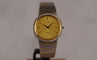 Montre Seiko Laurel - Montre unisexe acier et lunette or jaune 58 Facettes TOT-10679