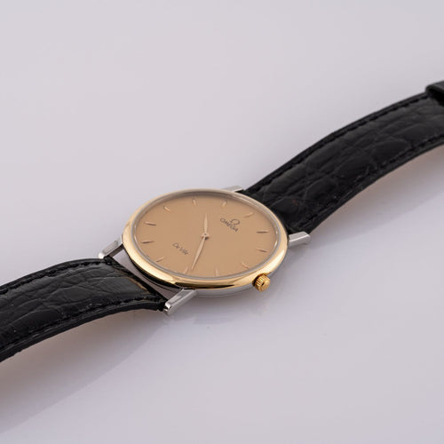 Montre Omega De Ville - Montre unisexe en or jaune et acier 58 Facettes TOT-01937