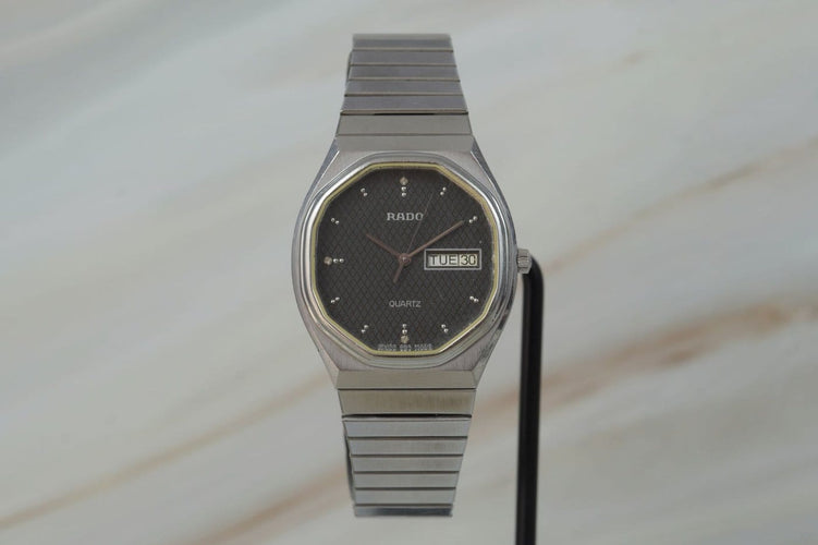 Montre Rado - Montre Quartz Day Date 114.3479.4 58 Facettes TOT-11208