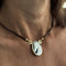 https://ledial.it/app/uploads/2022/10/33169-collana-oro-ciondolo-cammeo-cavallo-indossato_sito.jpg