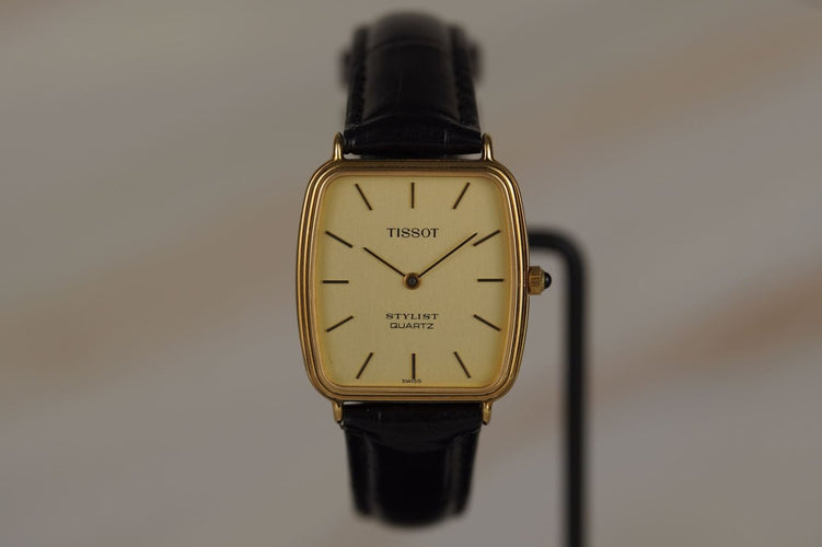 Montre Tissot Stylist - Montre tonneau plaqué or 58 Facettes TOT-11041