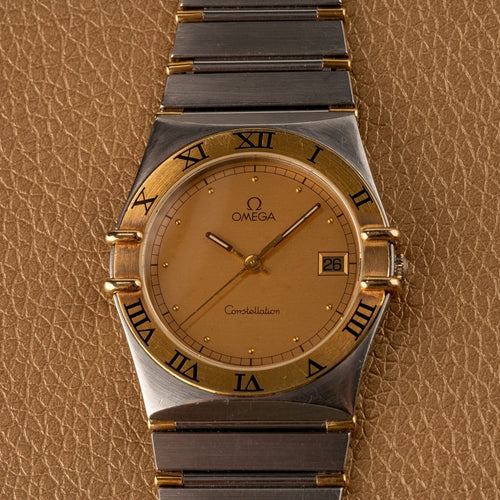Montre Omega Constellation - Montre en or et acier 58 Facettes TOT-02214