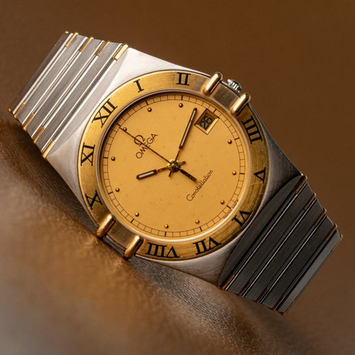 Montre Omega Constellation - Montre en or et acier 58 Facettes TOT-02214