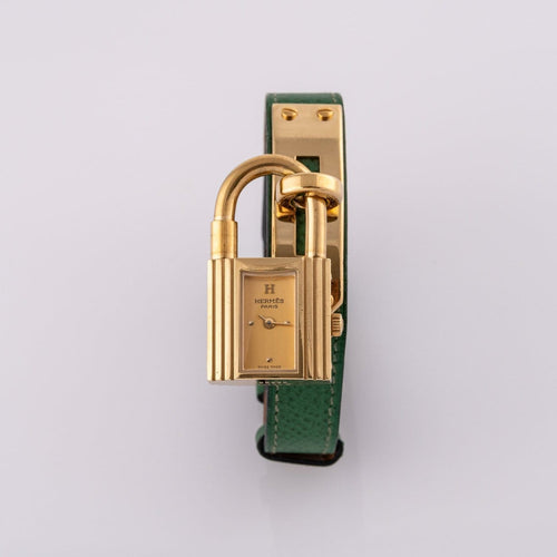 Montre Hermès Kelly - Montre plaqué or cuir vert 58 Facettes TOT-02370