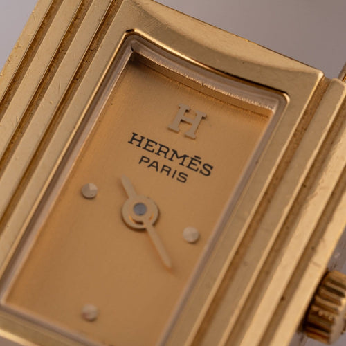 Montre Hermès Kelly - Montre plaqué or cuir vert 58 Facettes TOT-02370