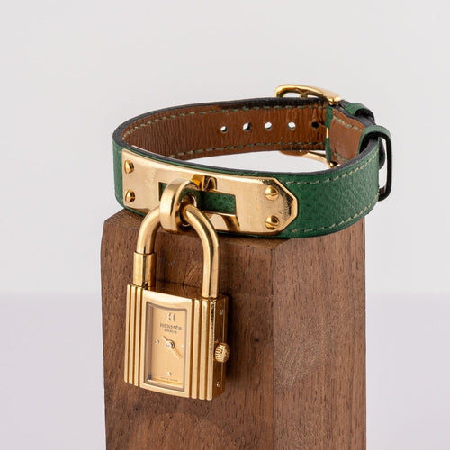 Montre Hermès Kelly - Montre plaqué or cuir vert 58 Facettes TOT-02370