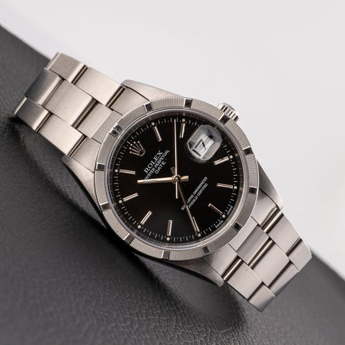 Montre Rolex Oyster Perpetual Date - Montre en acier 58 Facettes TOT-02282