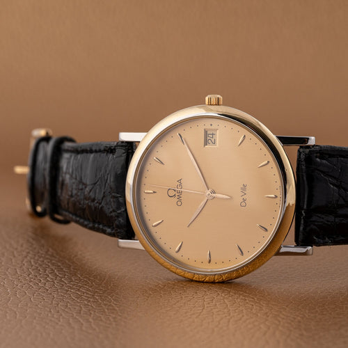 Montre Omega De Ville - Montre quartz en acier et plaqué or 58 Facettes TOT-01793