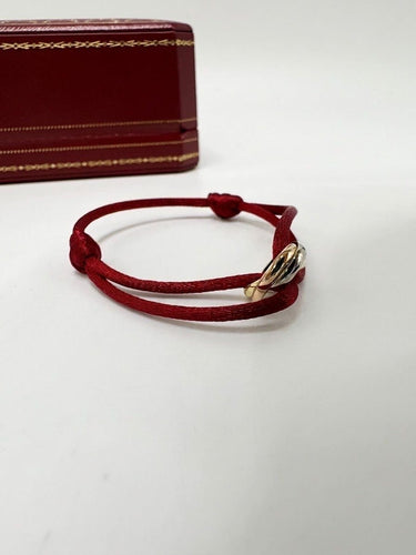Bracelet Cartier Trinity - Bracelet cordon en trois ors 18K 58 Facettes SKU : BOP/260063