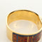 Hermès Zatrzask - metalowa bransoletka bangle z nadrukowaną emalią 58 Facettes q8b78hsd8k